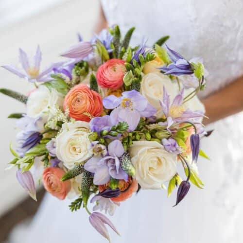 purple.coral bridal bouquet
